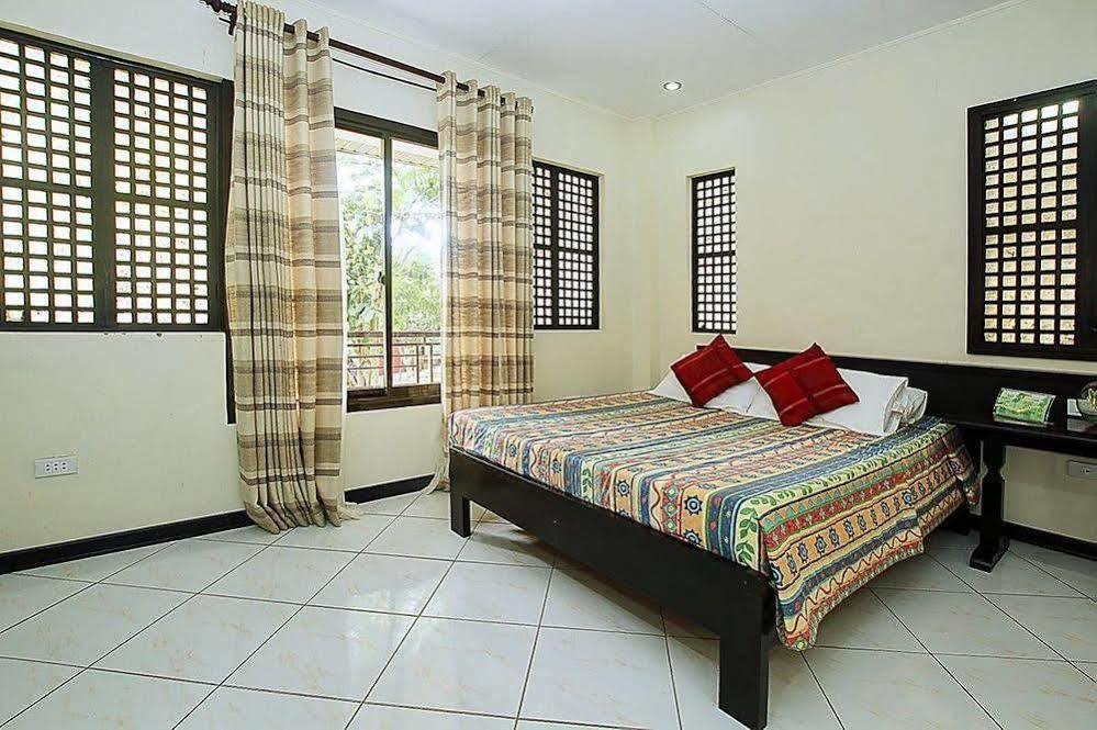 Reddoorz Premium @ Ouan'S The Farm Resort لوسينا المظهر الخارجي الصورة